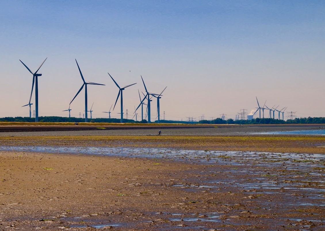 Windmolens langs het water, foto Nelleke Heinkens